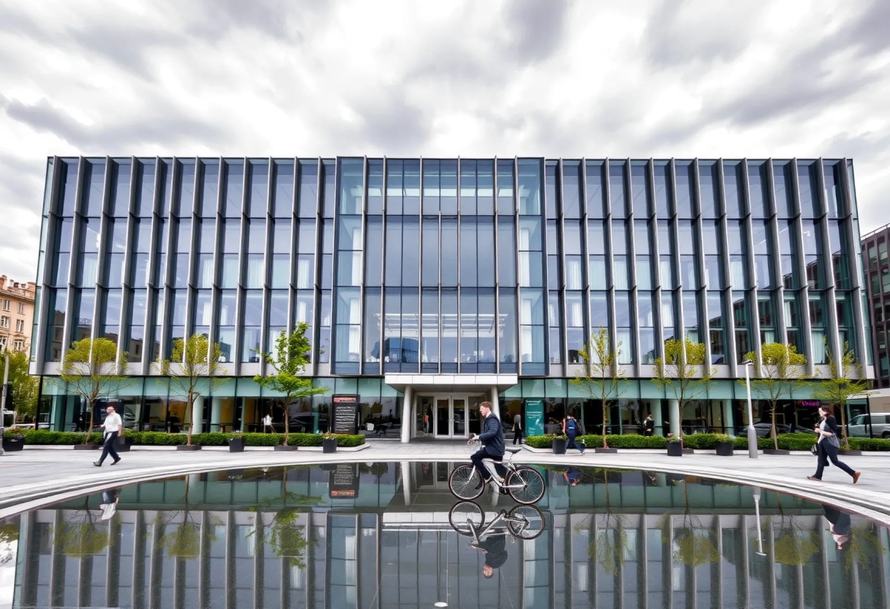 Moderne Architektur: Glas-Stahl-Gebäude mit geometrischen Formen und urbanem Umfeld