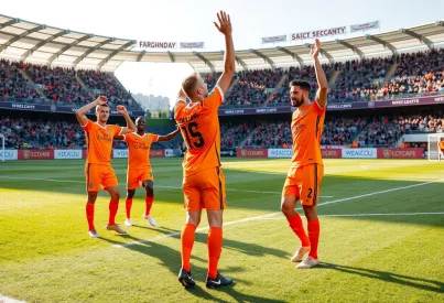 Fußballspieler feiern Sieg nach entscheidendem Tor im Stadion
