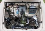 The engine compartment of a 1959 Wolseley 1500 showing the packaging of its 1500cc BMC B-Series engine.